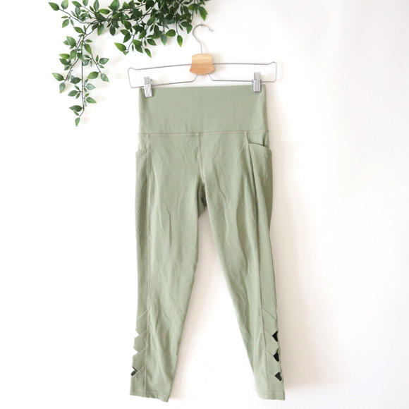 Athleta Sage Green Salutation Stash Pocket II Cutout 7/8 Leggings Size Small - Picture 1 of 4